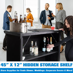 a woman is putting a bottle of wine into a cooler