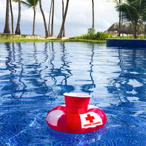 a red life preserveer floating in a pool