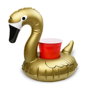 a gold flamingo with a red cup in it