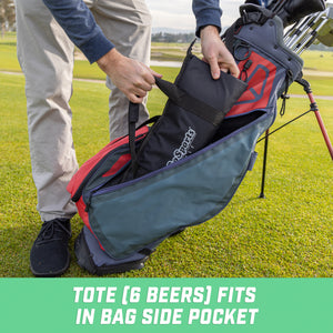 a man putting a golf bag on the grass