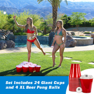 two women in bikinis playing beer pong