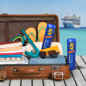 a suitcase filled with items for a beach vacation