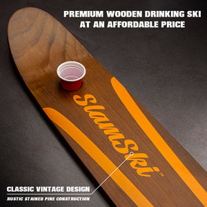 a wooden skate board with a cup on top